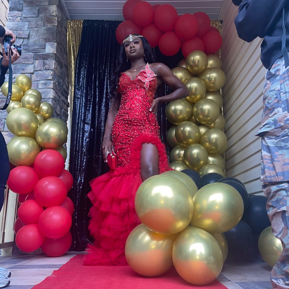 Prom Royalty: Luxe Red Beaded Gown with Dramatic Train